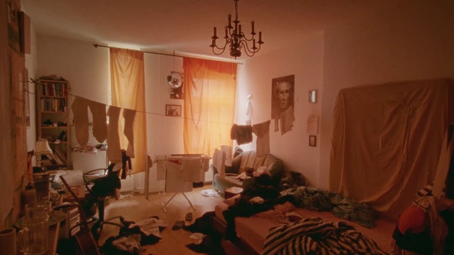 Video Reference: Room, Bedroom, Property, Interior design, Bed, Furniture, Bed sheet, Wall, House, Floor