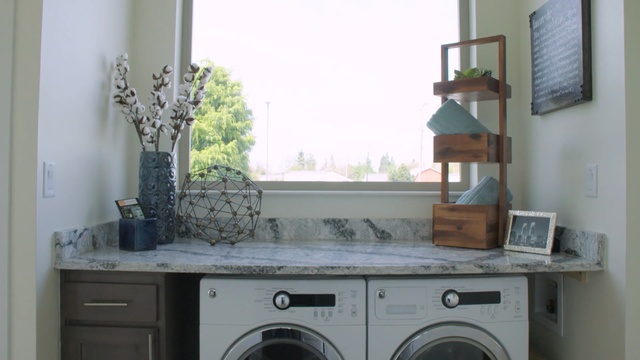 Video Reference: room, property, laundry room, countertop, kitchen, home, laundry, window, major appliance, home appliance
