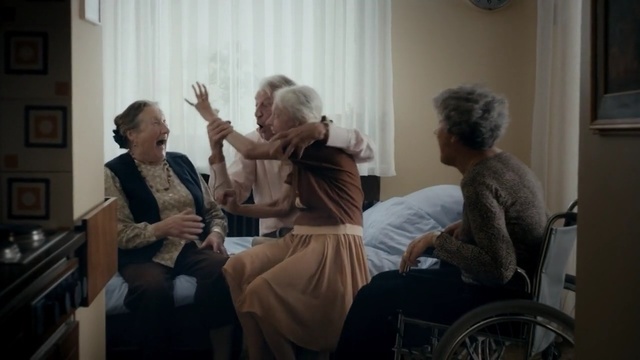 Video Reference: Wheelchair, Conversation, Retirement home, Event, Interaction, Sitting