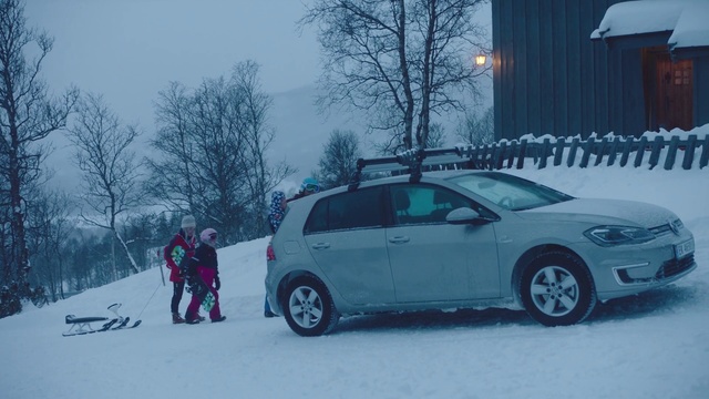 Video Reference: Land vehicle, Vehicle, Snow, Car, Winter, Hatchback, Volkswagen golf, Winter storm, Compact car, Volkswagen, Person