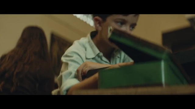 Video Reference: Music, Sitting, Arm, Human, Mouth, Fun, Song, Headgear, Screenshot, Person