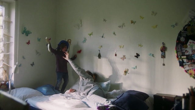 Video Reference: Bed, Wall, Room, Bedroom, Bed sheet, Leg, Shoulder, Wallpaper, Joint, Textile, Person