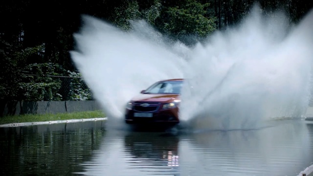 Video Reference: car, water, automotive design, motorsport, reflection, smoke, world rally championship, motor vehicle, vehicle, rallying