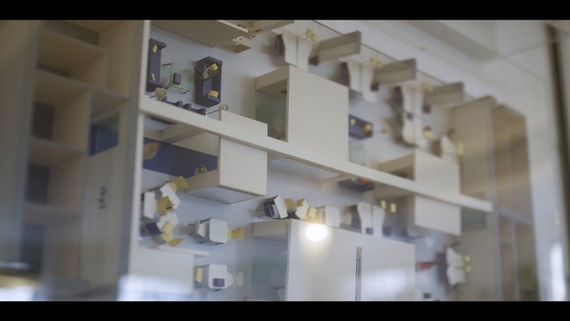 Video Reference: Architecture, Shelf, Scale model, Wall, Room, House, Interior design, Design, Material property, Shelving