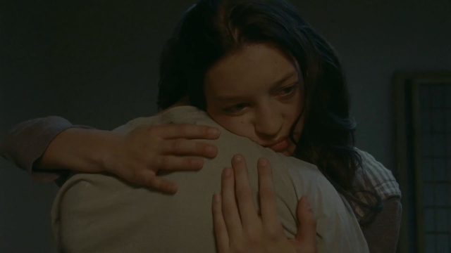 Video Reference: hand, girl, mouth, finger, arm, human, scene, screenshot, darkness, Person