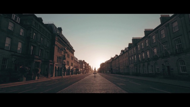 Video Reference: Sky, Photograph, Town, Urban area, Landmark, Morning, Street, Light, Road, Daytime
