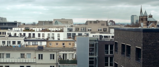 Video Reference: Residential area, Property, Urban area, Building, Roof, Apartment, Architecture, Town, Neighbourhood, Human settlement, Person