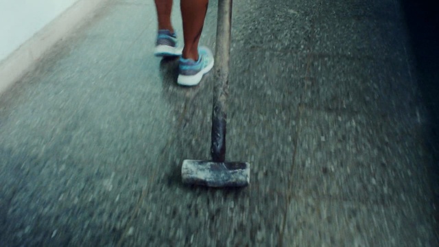Video Reference: Floor, Asphalt, Leg, Human leg, Road surface, Flooring, Kick scooter, Foot, Shoe, Jeans, Person