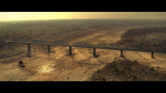 Video Reference: Horizon, Atmospheric phenomenon, Sky, Ecoregion, Photography, Aerial photography, Landscape, Bridge, Sunlight, Plain