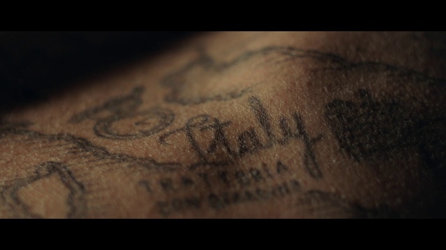 Video Reference: Tattoo, Skin, Close-up, Text, Arm, Flesh, Human, Font, Mouth, Photography
