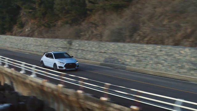 Video Reference: Land vehicle, Vehicle, Car, Race track, Performance car, Personal luxury car, Automotive design, Luxury vehicle, Sports car, Sports sedan