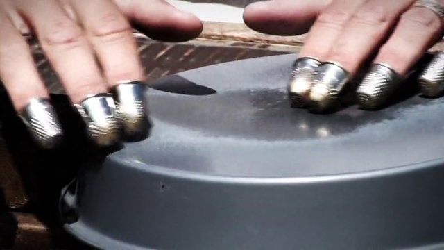 Video Reference: Hand, Nail, Finger, Auto part, Rim, Wheel, Metal