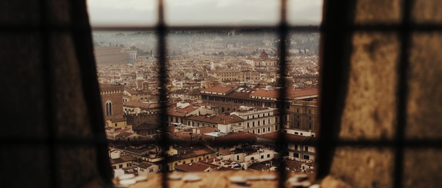 Video Reference: Text, City, Urban area, Sky, Font, Architecture, Wood, Reflection, Window, Photography, Person
