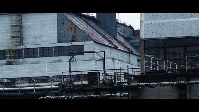 Video Reference: Architecture, Urban area, City, Building, Reflection, Material property, Black-and-white, Monochrome, Downtown, Bridge, Train, Large, Track, White, Long, Sitting, Traveling, Black, Standing, Table, Covered, Tall, Room, Water, Old, Station, Clock, Subway, River, Riding, Street, Snow, Bus, Night, Skyscraper, Sky, Window, Roof