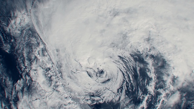 Video Reference: tropical cyclone, atmosphere, sky, geological phenomenon, cyclone, freezing, earth, glacial landform, aerial photography, ice cap