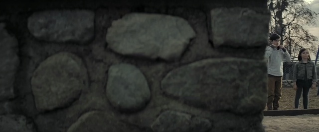 Video Reference: black, rock, wall, stone wall, darkness, material, tree, geology, font, formation, Person