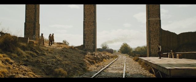 Video Reference: track, transport, sky, cloud, rail transport, tree, road, landscape, building, ruins
