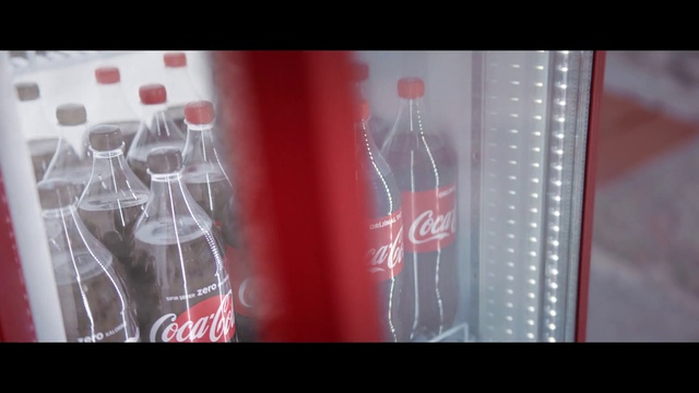 Video Reference: Coca-cola, Glass bottle, Red, Cola, Bottle, Drink, Text, Water, Carbonated soft drinks, Soft drink
