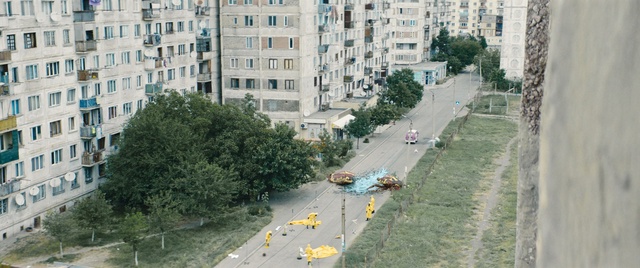 Video Reference: Residential area, Neighbourhood, Urban area, Metropolitan area, Thoroughfare, Human settlement, City, Urban design, Road, Building