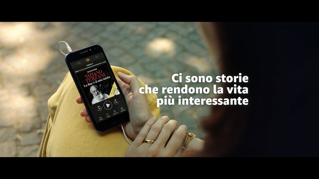Video Reference: Gadget, Mobile phone, Product, Text, Smartphone, Feature phone, Portable communications device, Font, Electronic device, Technology, Person, Cellphone, Phone, Holding, Photo, Hand, Sitting, Using, Small, Black, Man, Woman, Table, Wearing, Screen, Someone, Remote, Red, Laying, Screenshot, Watch