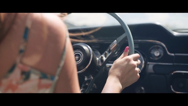 Video Reference: car, steering part, automotive design, hand, photography, audio equipment, vehicle, steering wheel, driving, finger, Person