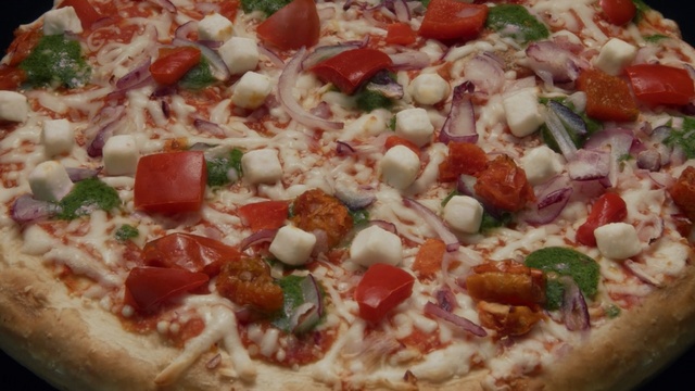 Video Reference: pizza, dish, cuisine, italian food, california style pizza, pizza cheese, european food, food, sicilian pizza, tarte flambée