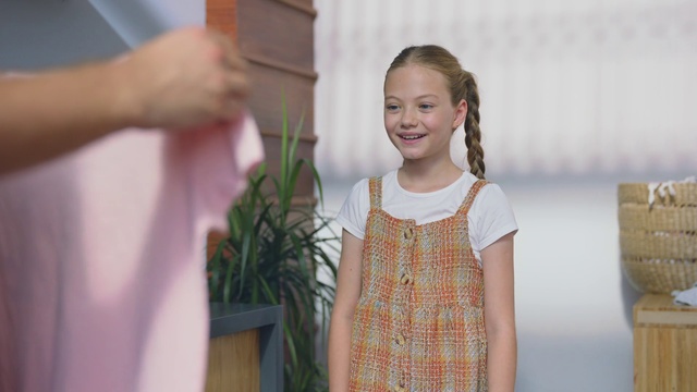 Video Reference: Child, Pattern, Design, Dress, Child model, Toddler, Plant, Pattern, Smile