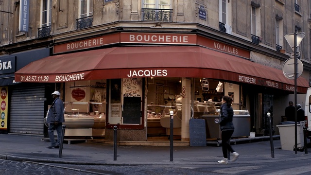 Video Reference: city, urban area, street, downtown, neighbourhood, facade, building, café, window, restaurant