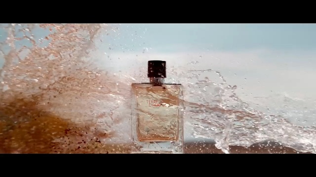 Video Reference: perfume, water, atmosphere, photography, sky, glass bottle, geological phenomenon, still life photography, Person