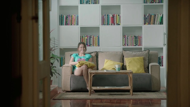 Video Reference: shelving, furniture, room, shelf, bookcase, home, interior design, window, table, house, Person