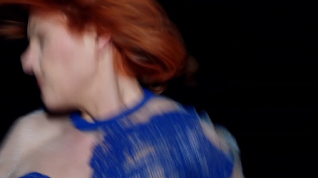 Video Reference: hair, blue, red, woman, black, human hair color, facial expression, beauty, lady, nose