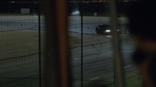 Video Reference: night, darkness, infrastructure, light, urban area, structure, reflection, lighting, atmosphere, street light, Person