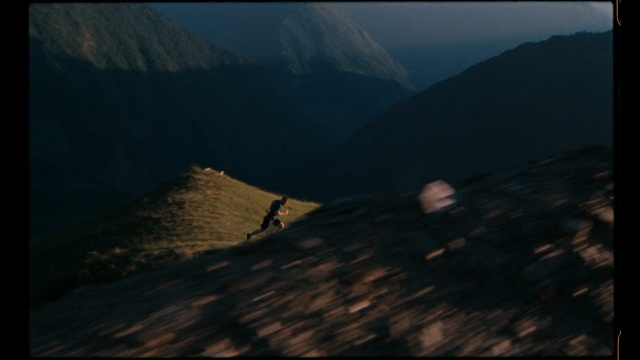 Video Reference: sky, mountain, mountainous landforms, ridge, wilderness, mountain range, atmosphere, highland, terrain, geological phenomenon