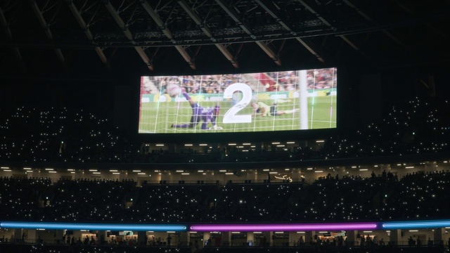 Video Reference: Field house, Light, Flat panel display, Display device, Fan, Entertainment, Technology, Font, Player, Electronic device