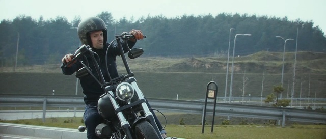 Video Reference: land vehicle, vehicle, motorcycling, motorcycle, car, personal protective equipment, tree, sports equipment, bicycle, recreation