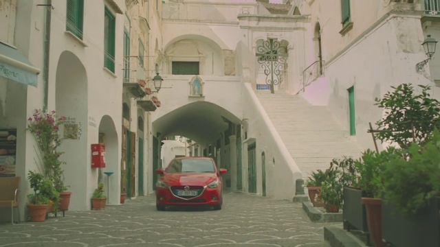 Video Reference: Vehicle, Car, Building, Architecture, Arch, Compact car, Subcompact car, City car, Arcade, House