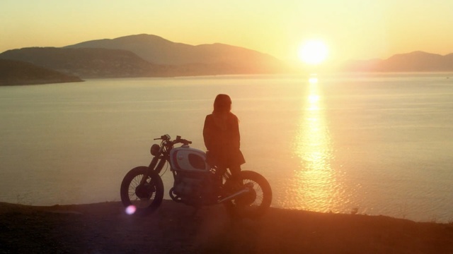 Video Reference: sunrise, sky, sunset, sun, horizon, morning, sea, sunlight, sand, reflection, Person