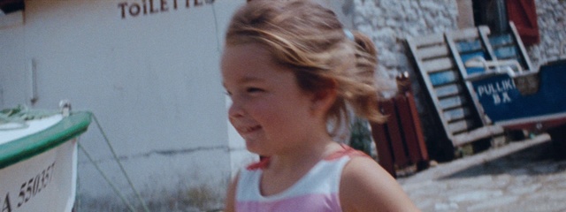 Video Reference: Hair, Face, Hairstyle, Blond, Nose, Chin, Ear, Child, Brown hair, Smile, Person