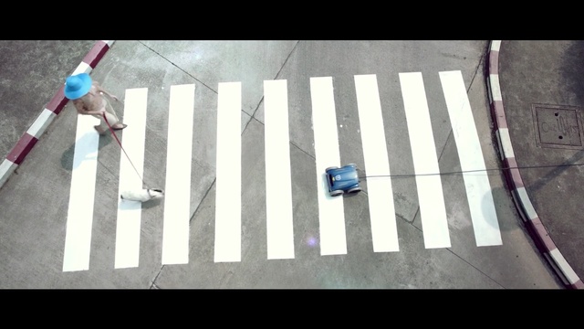 Video Reference: Pedestrian crossing, Zebra crossing, Line, Road, Infrastructure, Pedestrian, Street, Recreation, Sidewalk, Shadow