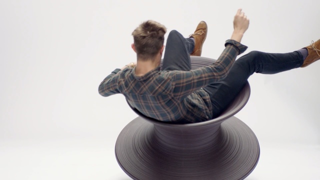 Video Reference: Sitting, Arm, Fun, Automotive wheel system, Hand, Wheel, Furniture, Sculpture, Balance, Art