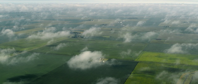 Video Reference: Aerial photography, Sky, Atmospheric phenomenon, Atmosphere, Birds-eye view, Cloud, Air travel, Plain, Haze, Landscape