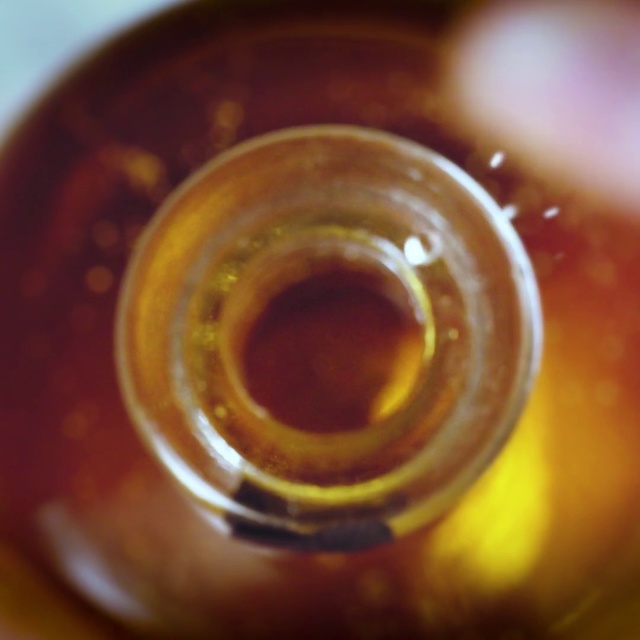 Video Reference: Caramel color, Circle, Close-up, Eye, Photography, Drink
