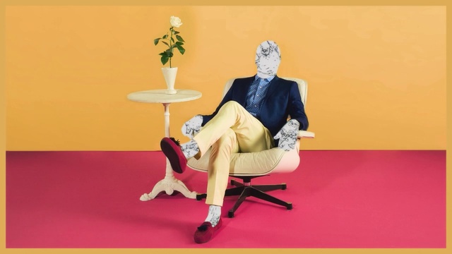 Video Reference: Sitting, Furniture, Chair, Table, Gentleman, Person, Woman, Yellow, Man, Holding, Looking, Front, Standing, Monitor, Television, Red, Screen, Playing, Room, Girl, Young, Rug, Ball, White, Blue, Bed, Court, Wall, Couch, Cartoon, Footwear