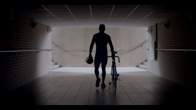 Video Reference: Standing, Photography, Shadow, Darkness, Vehicle, Bicycle, Black-and-white, Bmx bike, Symmetry, Person