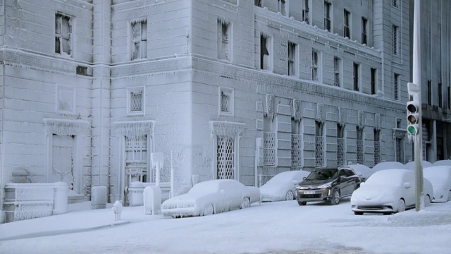 Video Reference: snow, winter, freezing, urban area, neighbourhood, winter storm, building, blizzard, window, home, Person