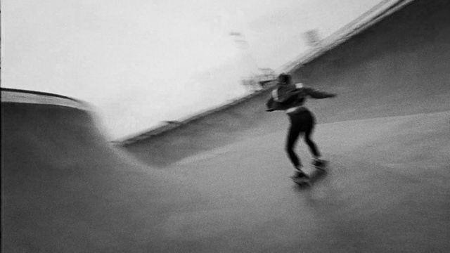 Video Reference: White, Black-and-white, Skateboarder, Skateboarding, Skateboard, Skateboarding Equipment, Monochrome photography, Recreation, Snapshot, Footwear