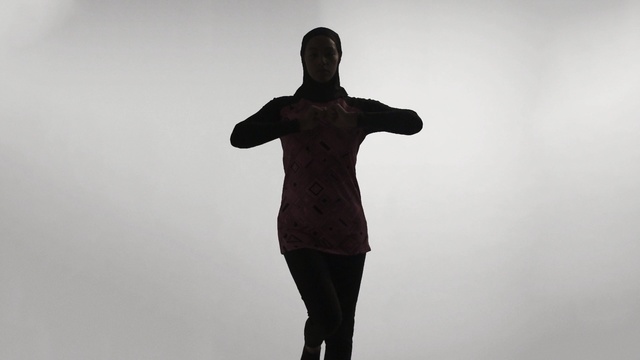 Video Reference: standing, shoulder, sleeve, joint, outerwear, neck, arm, t shirt, top