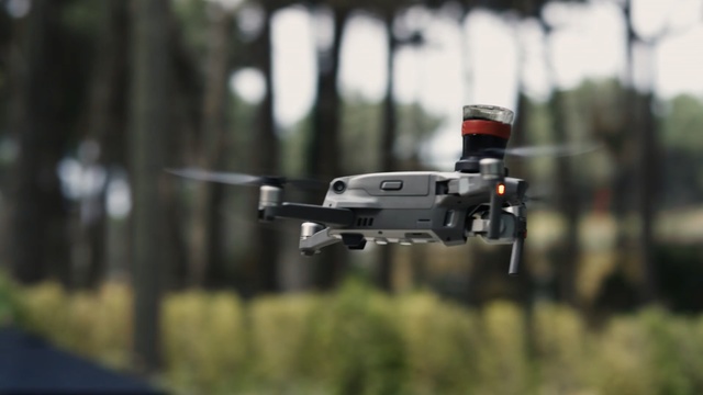 Video Reference: Vehicle, Radio-controlled toy, Tree, Scale model, Grass, Outdoor, Small, Plane, Red, Flying, Driving, Riding, Street, Traveling, Airplane, Man, White, Forest, Air, Field, City, Hydrant, Weapon, Helicopter, Aviation, Aircraft