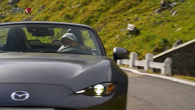 Video Reference: car, land vehicle, motor vehicle, vehicle, mazda, personal luxury car, automotive design, mode of transport, mid size car, sports car, Person