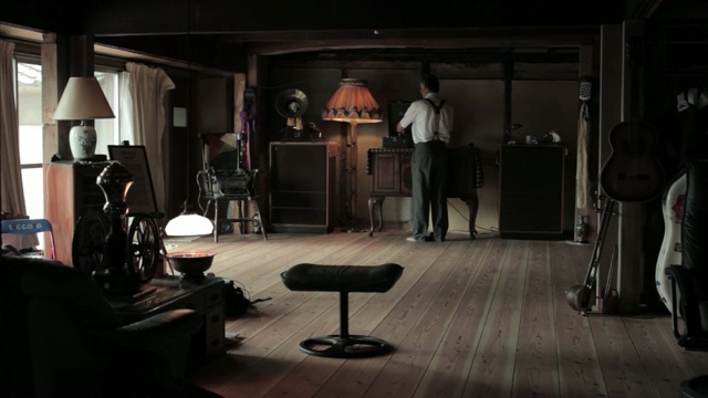 Video Reference: film studio, interior design, furniture, flooring, darkness, Person